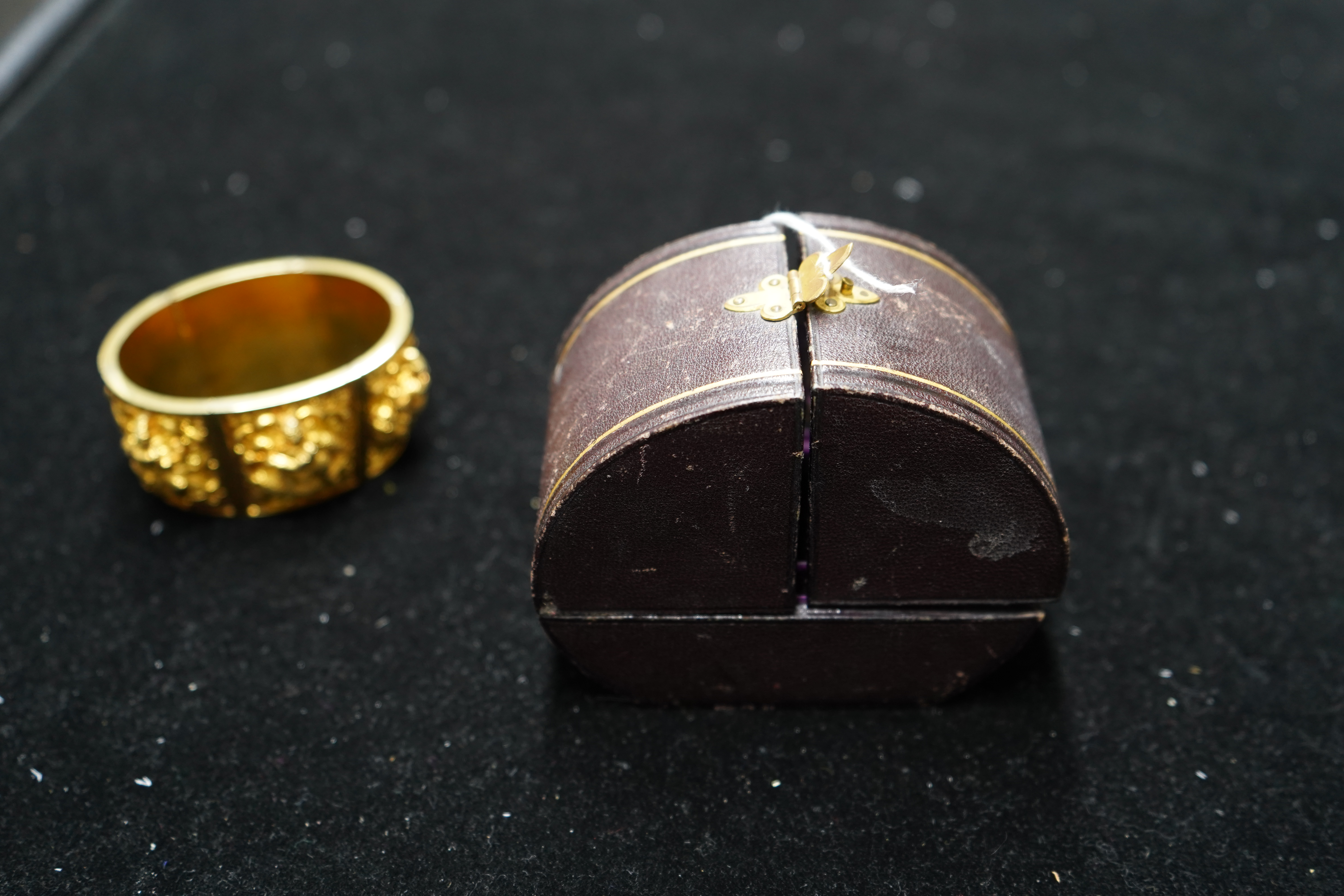 An early 20th century Indian gold hinged panelled cuff bracelet